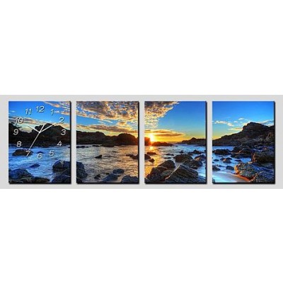 Horloge murale Coucher du soleil sur les rochers