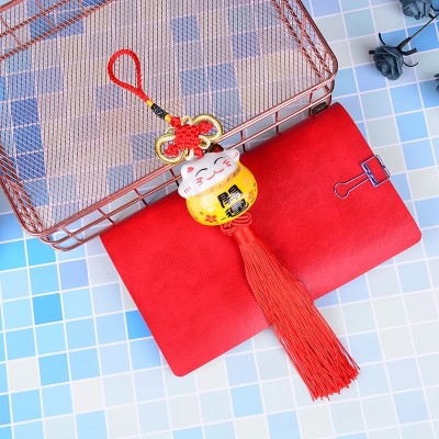 Suspension Maneki Neko jaune