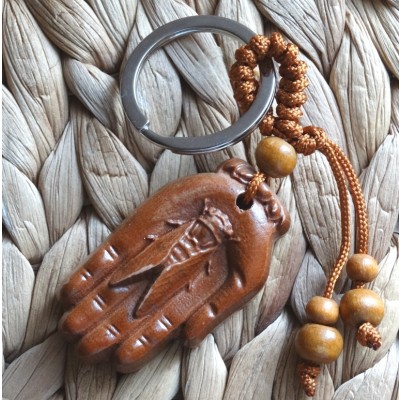 Porte Clés Cigale dans la main de Bouddha