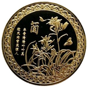 amulette dorée orchidées quatre gentilshommes feng shui