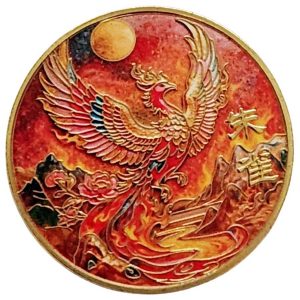 Amulette Phénix Rouge Rayonnant Feng Shui représentant un phénix renaissant dans les flammes